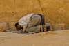 Jordan - Petra: prayer near the Khazneh - photo by M.Torres