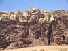 Jordan - Wadi Rum - Aqaba governorate: bi-coloured cliff - sandstone and granite - photo by R.Wallace