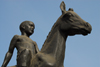 Kazakhstan, Almaty: Republic square - boy on horse - detail - photo by M.Torres