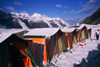 Kazakhstan - Tian Shan mountain range: mountaineering base camp on a glacier at the bottom of Khan Tengri mountain - tents - photo by E.Petitalot