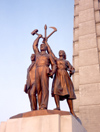 North Korea / DPRK - Pyongyang: Tower of the Juche Idea - central statues - emblem of the Workers' Party of Korea with a worker, a peasant and an intellectual holding a hammer, sickle and writing brush - photo by M.Torres