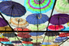 Erbil / Hewler, Kurdistan, Iraq: Shanadar Park - ceiling of umbrellas used to provide a shaded walkway, a ceiling of colour - photo by M.Torres