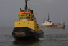 Latvia - Ventspils: tugboat Marss - Portuguese ship  Astra in the background (photo by A.Dnieprowsky)