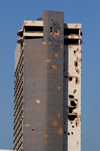 Lebanon / Liban - Beirut: war damage - old Holiday Inn hotel - building with artillery impacts - photo by J.Wreford