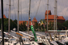 Lithuania - Trakai: masts - Galve Lake - yachts and Trakai castle - photo by A.Dnieprowsky