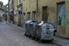 Lithuania - Vilnius: rubbish containers on a back-street - photo by A.Dnieprowsky