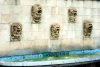 Luxembourg Ville / LUX: ugly faces - fountain on Bd. Franklin-Roosevelt (photo by M.Torres)