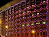 Macau, China: the original Casino Lisboa at night - circles on the hotel faade - photo by M.Torres