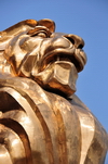 Macau, China: close-up of the golden lion at the MGM Grand Macau hotel and casino - photo by M.Torres