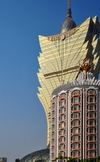 Macau, China: the original Casino Lisboa and the Grand Lisboa tower - photo by M.Torres