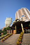 Macau, China: main entrance to the original Casino Lisboa with the Grand Lisboa in the background - photo by M.Torres