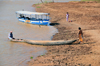 Tsimafana, Belo sur Tsiribihina district, Menabe Region, Toliara Province, Madagascar: old and new boats compete to take passengers across the Tsiribihina river - photo by M.Torres