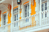 Antananarivo / Tananarive / Tana - Analamanga region, Madagascar: gracious colonial balcony - wooden railing  - Rue Ramanantsoa - photo by M.Torres