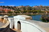 Antananarivo / Tananarive / Tana - Analamanga region, Madagascar: lake Anosy and the entrance of the Monument aux Morts - Rue Mohamed V and the Haute-Ville in the backgroud - Lyce Gallini d'Andohalo, Collge St-Michel, palaces... - photo by M.Torres