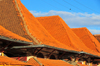 Antananarivo, Madagascar: roofs of the pavilions at Analakely Market in central Tana - red roof shingles - photo by M.Torres