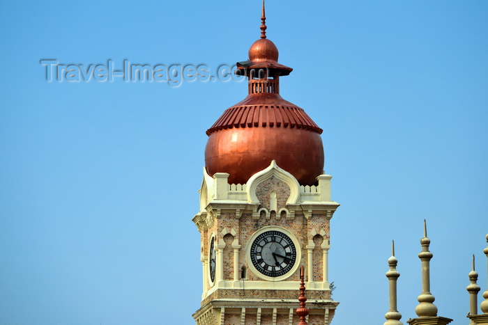 mal110: Kuala Lumpur, Malaysia: clock tower with copper-clad onion dome of the Sultan Abdul Samad Building, the British colonial Government Offices - photo by M.Torres - (c) Travel-Images.com - Stock Photography agency - Image Bank