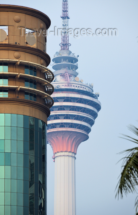 mal120: Kuala Lumpur, Malaysia: OCBC Bank building and Kuala Lumpur Tower - Menara Kuala Lumpur - photo by M.Torres - (c) Travel-Images.com - Stock Photography agency - Image Bank