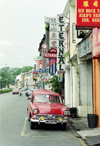 Malaysia - Sarawak (Borneo): red Hillman on a commercial street (photo by Rod Eime)