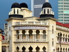 Kuala Lumpur, Malaysia: Old High Courts - colonial architecture with modern bank towers in the background - photo by M.Torres