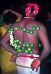 Batu Caves, Gombak, Selangor: Thaipusam Hindu festival - Kavadi - hooked offerings on the back of a Tamil man - photo by B.Lendrum