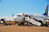 Blantyre, Malawi: South African Airways Boeing 737-8S3(WL) - ZS-SJB cn 29249 - Johannesburg passengers disembark at Chileka International Airport - Lilongwe Handling Co. stairs - photo by M.Torres