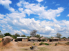 Lake Malombe, Malawi: village houses near a water well - thatched and zinc roofs - photo by M.Torres