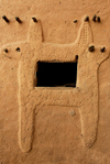 Bandiagara Escarpment, Dogon country, Mopti region, Mali: window decoration on a Dogon mud brick house - photo by J.Pemberton