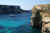 Malta - Comino: yacht under the cliffs (photo by A.Ferrari)