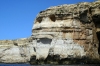 Malta - Gozo / Ghawdex: stone smiley - a funny face naturally carved in a cliff (photo by  A.Ferrari )