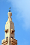Nouakchott, Mauritania: slender minaret with bronze crescent of the Saudi Mosque aka Grand Mosque - King Faisal avenue and Mamadou Konate street - la Mosque Saoudienne - photo by M.Torres