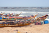 Nouakchott, Mauritania: traditional wooden fishing boats aligned along the beach - fishing harbor, the Port de Pche - photo by M.Torres