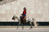 Ulan Bator / Ulaanbaatar, Mongolia: a soldier on his horse, Sukhbaatar square - photo by A.Ferrari