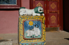 Ulan Bator / Ulaanbaatar, Mongolia: lion and cow in front of the library of Gandan Khiid Monastery - photo by A.Ferrari