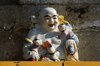 Ulan Bator / Ulaanbaatar, Mongolia: Small Buddhist statue on a stupa in Gandan Khiid Monastery - photo by A.Ferrari