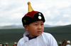 Ulan Bator / Ulaanbaatar, Mongolia: Naadam festival - young supporter at the horse races - Hui Doloon Khutag - photo by A.Ferrari