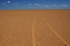 Gobi desert, southern Mongolia: tracks in the middle of the desert - photo by A.Ferrari