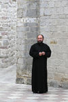 Montenegro - Crna Gora - Kotor: black clad Orthodox priest - photo by J.Kaman
