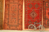 Morocco / Maroc - Marrakesh: Moroccan carpets and bike - photo by J.Banks