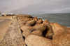 Asilah / Arzila, Morocco - waterfront - tetrapods and the Portuguese walls in the background - photo by Sandia