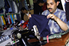 Agadir, Morocco: market - clothes maker - tailor - photo by Sandia
