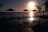 Pemba / Porto Amlia, Cabo Delgado, Mozambique / Moambique: Wimbe Beach - Nautilus Beach Resort - pool set against the sun and Pemba bay - tropical scene / praia Wimbi - piscina com sol a a baa em fundo - photo by F.Rigaud