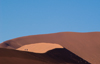 Namib Desert - Sossusvlei, Hardap region, Namibia, Africa: two hikers on Big Daddy sand dune - photo by B.Cain