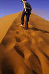 Namib Desert - Sossusvlei, Hardap region, Namibia: climbing the dunes barefoot - photo by Sandia