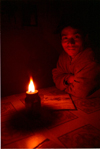 Nepal - Annapurna region: portrait by candlelight (photo by G.Friedman)