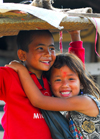Kathmandu, Nepal: smiling brother & sister - photo by E.Petitalot