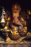Kirtipur, Kathmandu valley, Nepal: statue of Ganesha - Lord of Beginnings and of Obstacles, patron of arts and sciences, and the God of intellect and wisdom - photo by W.Allgwer