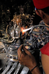 Patan, Lalitpur District, Bagmati Zone, Nepal: man making Budhist statue - photo by J.Pemberton