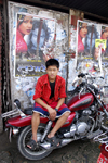 Patan, Lalitpur District, Bagmati Zone, Nepal: local boy on motorbike - photo by J.Pemberton