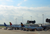 Haarlemmermeer, The Netherlands: Amsterdam Airport Schiphol - ground crews service Lufthansa, TAP Portugal and Finnair aircraft - Departure Hall 1, pier B - photo by M.Torres
