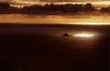 New Zealand - South island - Greymouth: south beach - sunset and sun ray - photo by Air West Coast